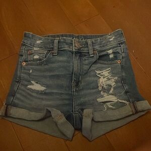i am selling blue denim ripped shorts from American eagle